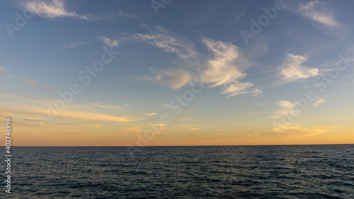 Beautiful and colorful sunset with cloud in the beach