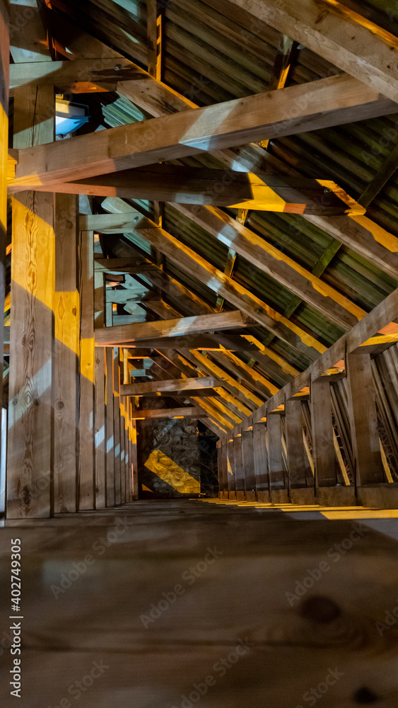 Ruins of Sigulda Medieval Castle, Latvia. Old Fortress Wooden Tower Interior With Window Hatches Night Shot.
