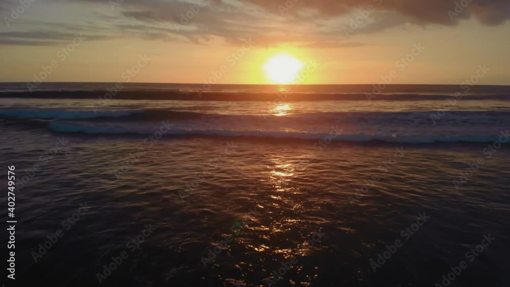 Flight at sunset overlooking the Indian Ocean in Bali Indonesia. Flight at sunset overlooking the Indian Ocean in Bali Indonesia.
