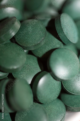 Green pills close up medical spirulina platensis space food modern high quality prints © BakalaeroZz
