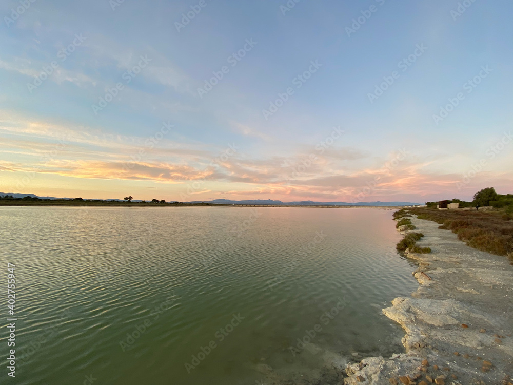 Beautiful and colorful sunset with cloud in the beach Beautiful and colorful sunset with cloud in the beach