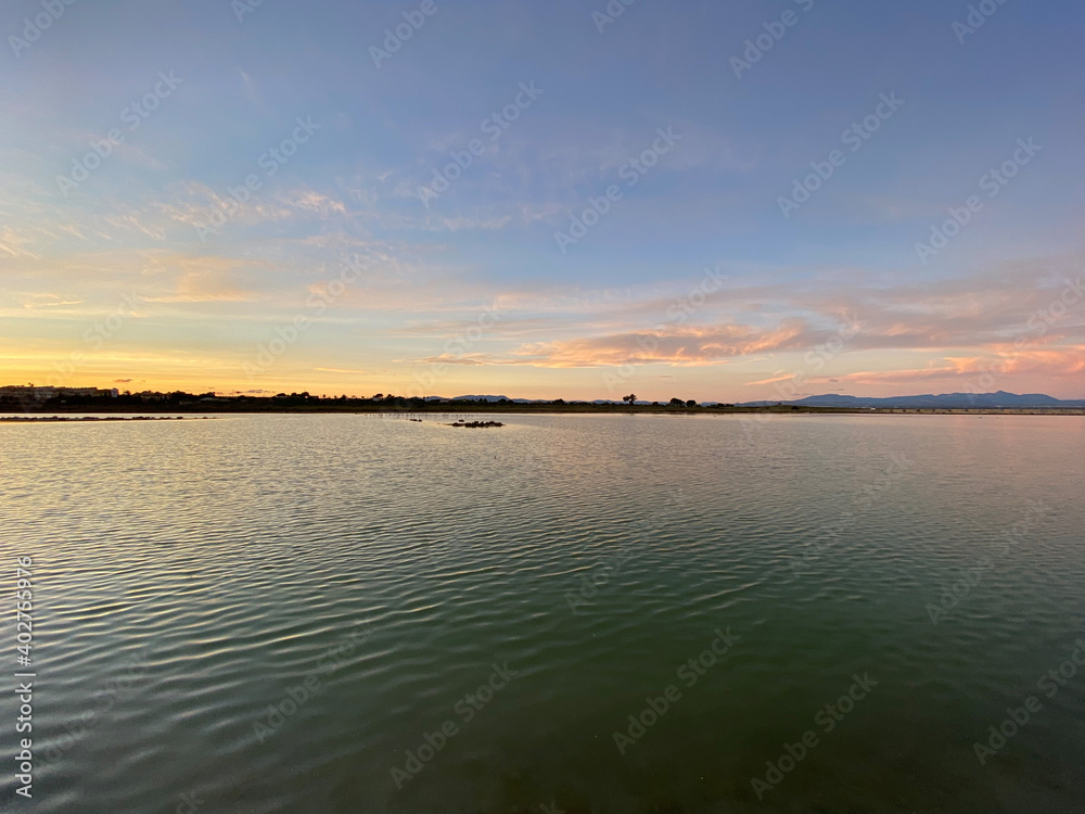 Fototapeta premium Beautiful and colorful sunset with cloud in the beach