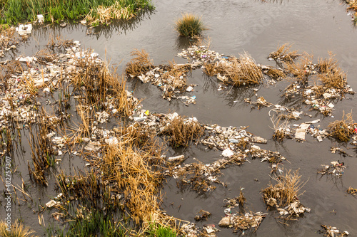 Plastic rubbish in Zanja Rud river in Iran photo