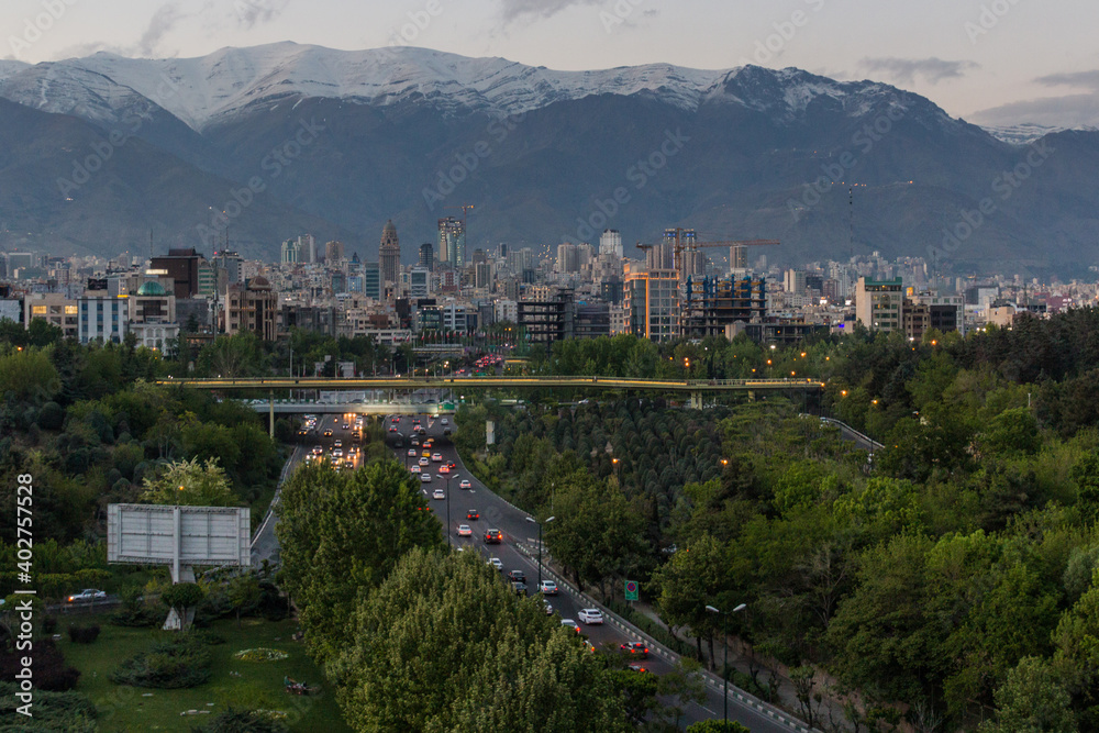 Evening view of Modares highway and Alborz mountain range in Tehran, Iran