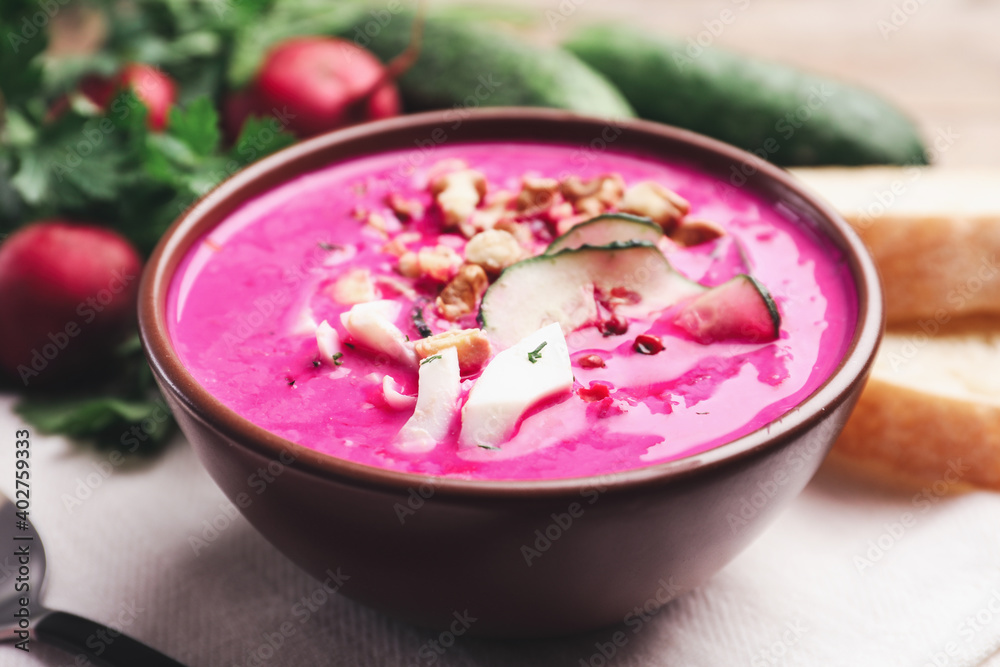 Delicious cold summer beet soup on table, closeup Delicious cold summer beet soup on table, closeup