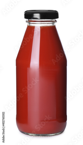 Bottle with tomato juice isolated on white