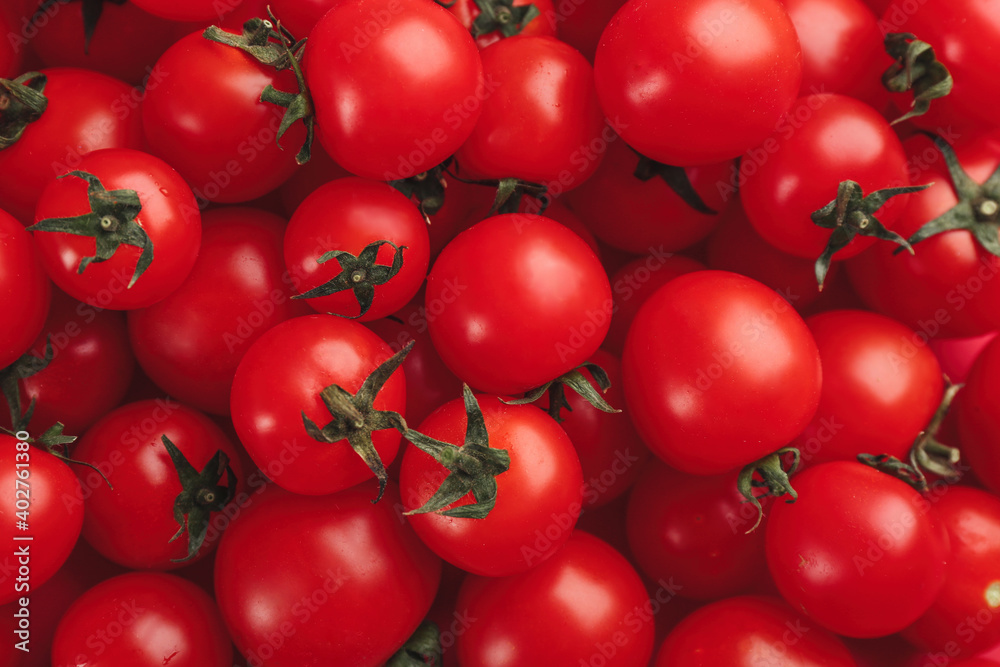 Many fresh cherry tomatoes as background, closeup