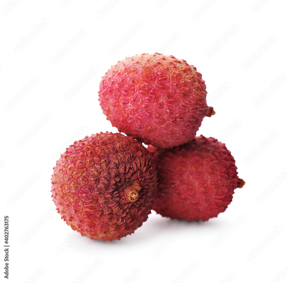 Fresh ripe lychees on white background. Exotic fruit Fresh ripe lychees on white background. Exotic fruit