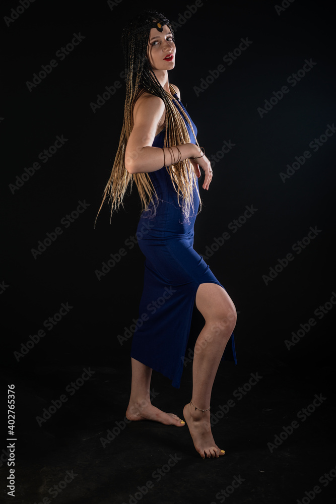 Portrait of a natural native, mystery girl wearing braids that looks like an ancient goddess. Portrait of a natural native, mystery girl wearing braids that looks like an ancient goddess.