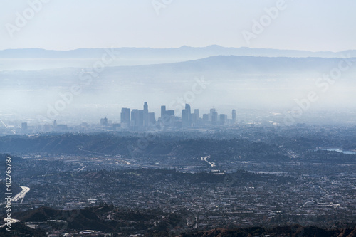 Hazy aerial view towards the downtown Los Angeles skyline in scenic Southern California.