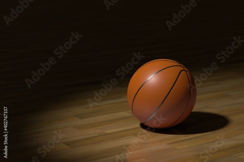 スポットライトで照らされたバスケットボール © stockfoto
