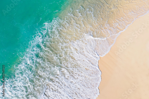 Waves breaking on the beach, aerial view