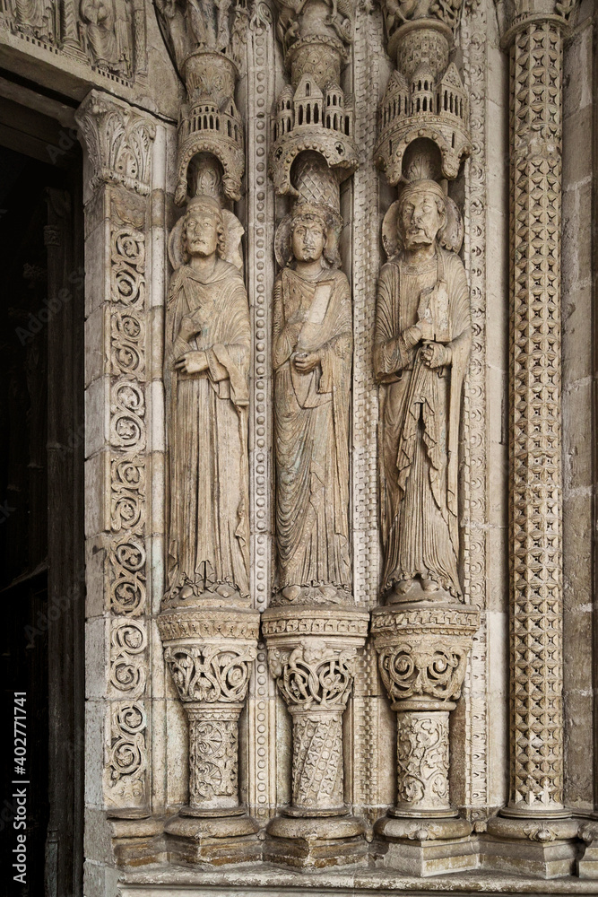 Saint-Étienne Cathedral, Bourges, France. South portal with three typically Gothic sculptures depicting prophets mentioned in the Old Testament.