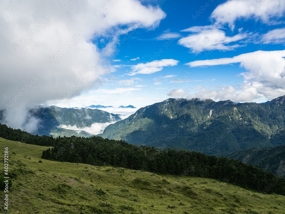 Smoke and fog over the landscapes. beautiful mountains with blue sky, Mount Hehuan, Taiwan
