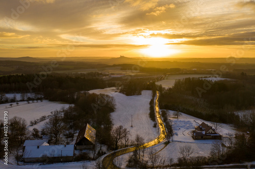 Panoramic view of amazing sunset in the countryside in winter © vladim_ka
