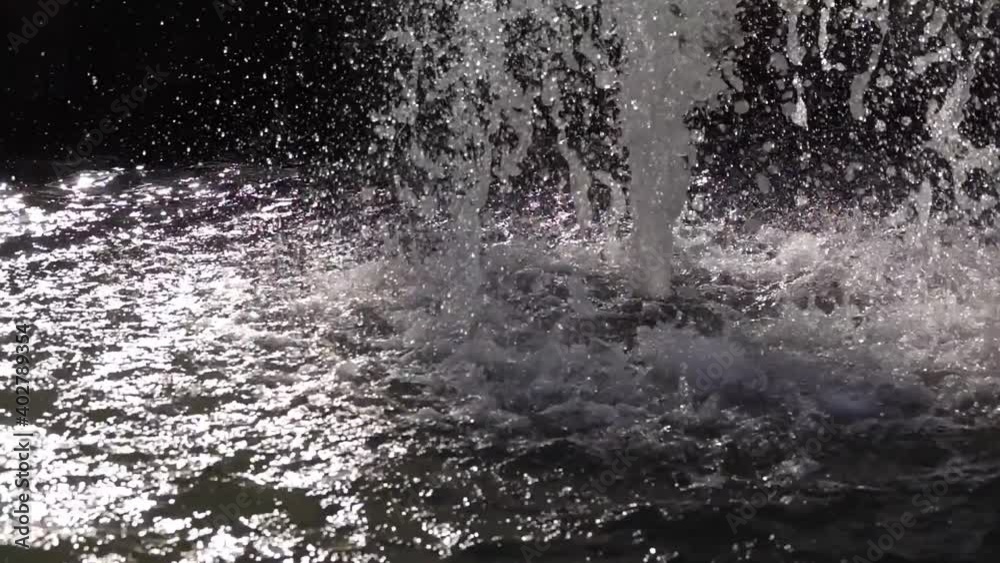 slow motion fountain. slow video of a fountain of falling water down in the park slow motion fountain. slow video of a fountain of falling water down in the park