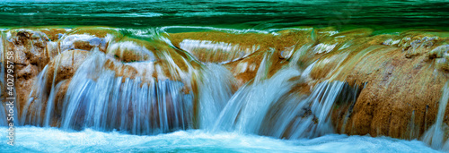 Colorful waterfall landscape. Gurleyik stream with long exposure, Mihaliccik, Eskisehir, Turkey. Panoramic shot. High resolution sharp photo. Panorama banner. photo