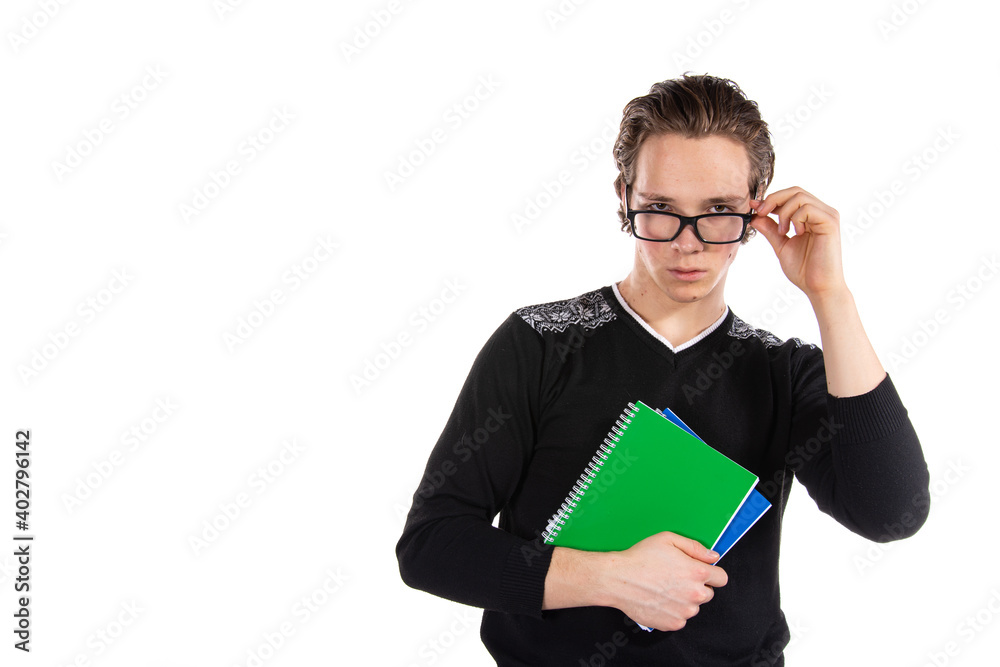 Student on a white background. Young attractive guy and books. Student on a white background. Young attractive guy and books.
