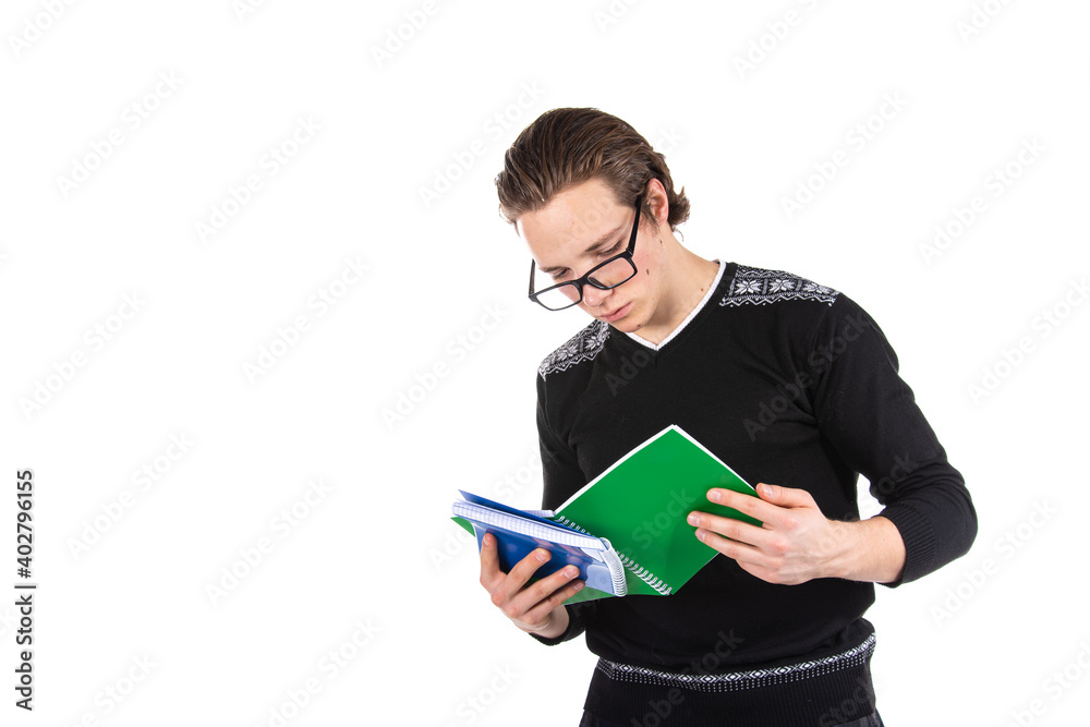 Student on a white background. Young attractive guy and books. Student on a white background. Young attractive guy and books.