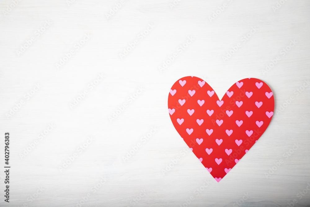 Fototapeta premium Red heart with copy space on white wooden background
