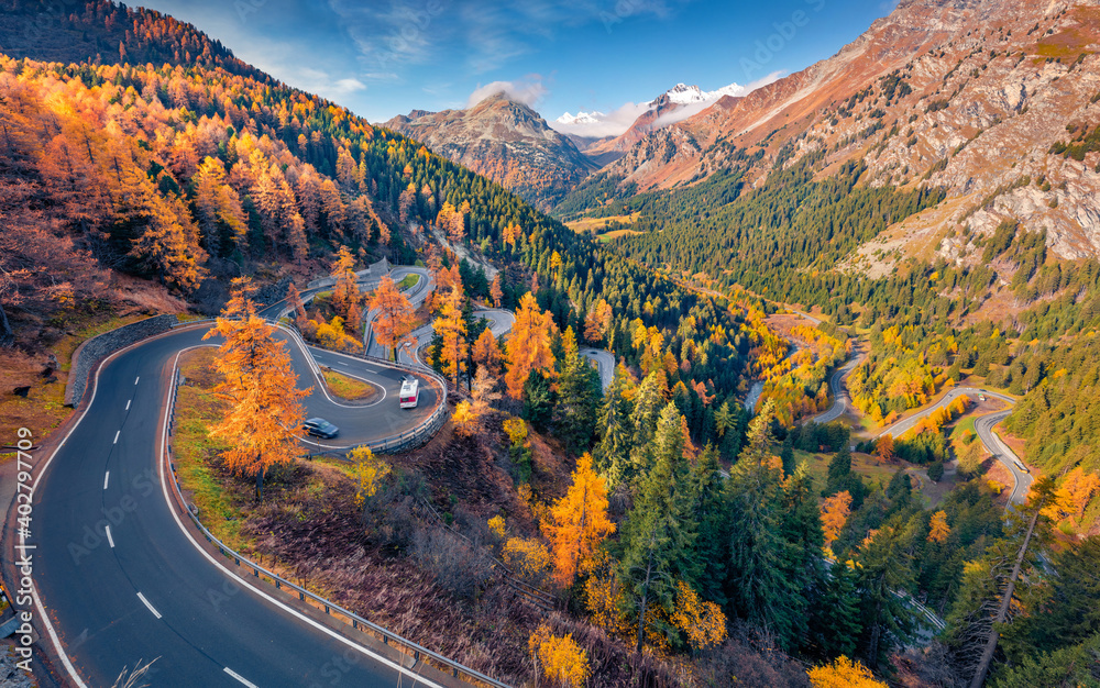 Aerial landscape photography. Colorful autumn scene of Maloja pass, Switzerland, Europe. Picturesque morning view from flying drone of Swass Alps. Traveling concept background..