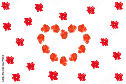 Heart from tulips and red flowers on a white background.