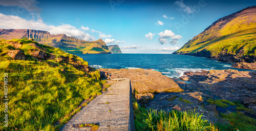 Landscape photography. Superb morning scene of Vidareidi public beach. Panoramic summer view of Vidoy island, Faroe, Kingdom of Denmark, Europe. Beauty of nature concept background.. photo