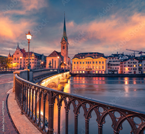 Сharm of the ancient cities of Europe. Adorable evening view of Fraumunster Church. Perfect autumn cityscape of Zurich, Switzerland, Europe. Sunset on Limmat River.
