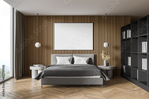 Wooden master bedroom with poster