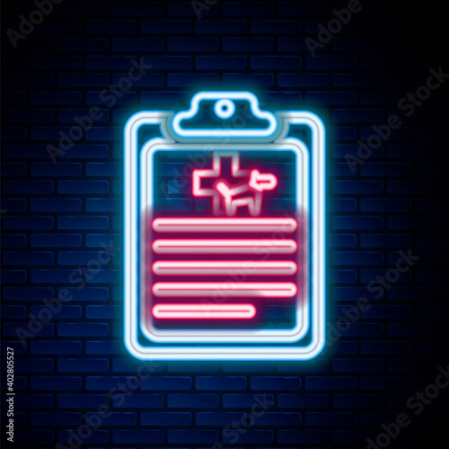 Glowing neon line Clipboard with medical clinical record pet icon isolated on brick wall background. Health insurance form. Medical check marks report. Colorful outline concept. Vector.
