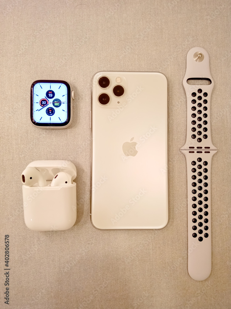 Apple iPhone 11 pro max with apple watch Photos | Adobe Stock