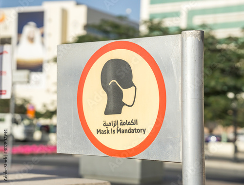Dubai , United Arab Emirates 
December 30th 2020 

Mask is mandatory sign outside of. the boat dock in Dubai creek due to the COVID 19 pandemic.