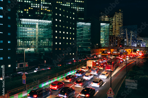 Traffic jam in the night city . Illuminated street of modern city 