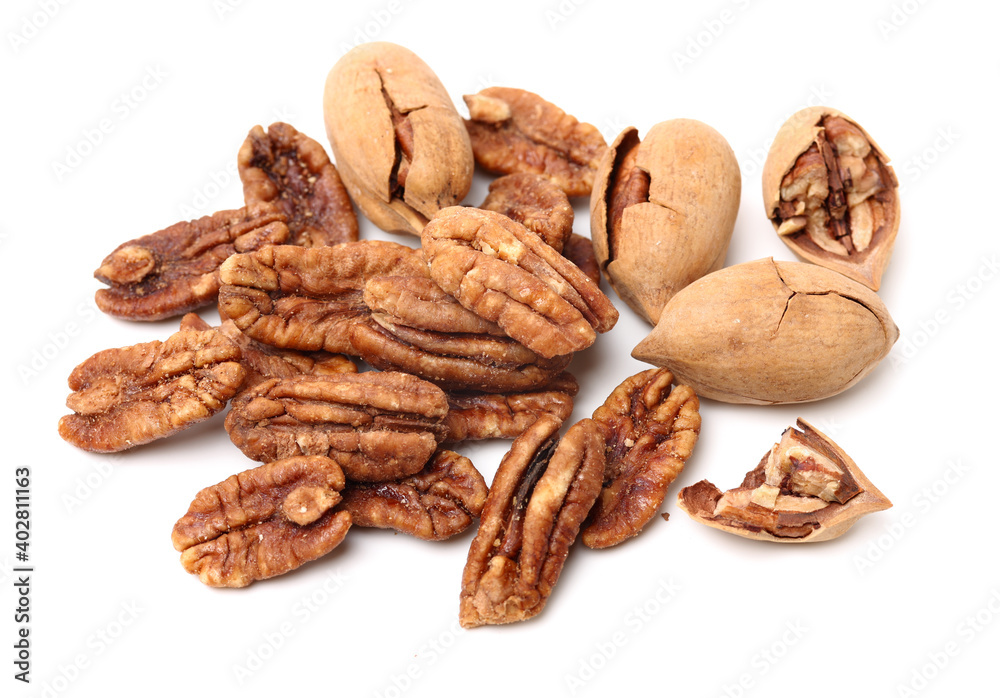 Peeled pecan nuts closeup, isolated on white background Peeled pecan nuts closeup, isolated on white background