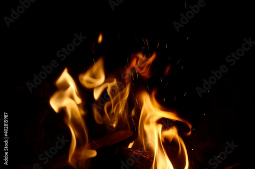 big fire in a fireplace. © markara