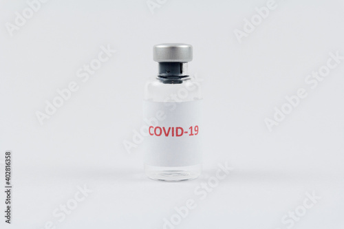 Corona virus vaccine in bottles on white background, COVID19