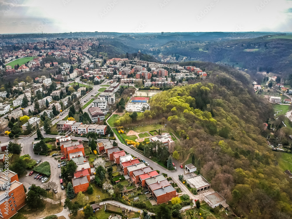 Aerial view of row houses and old funcionalism architecture in background in residential area of Baba in Prague 6, Czech republic