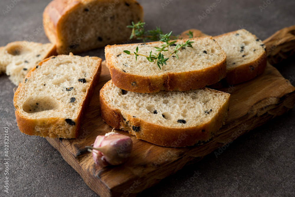 Italian ciabatta bread with olives and herbs