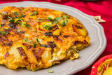 Traditional spanish tortilla on a white plate