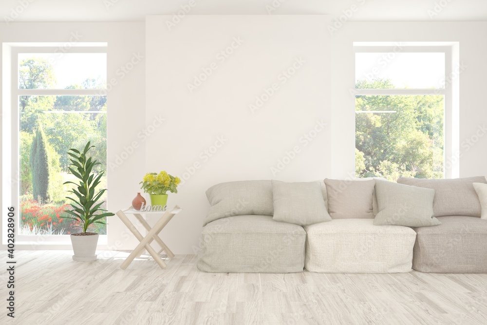 White living room with sofa and summer landscape in window. Scandinavian interior design. 3D illustration White living room with sofa and summer landscape in window. Scandinavian interior design. 3D illustration
