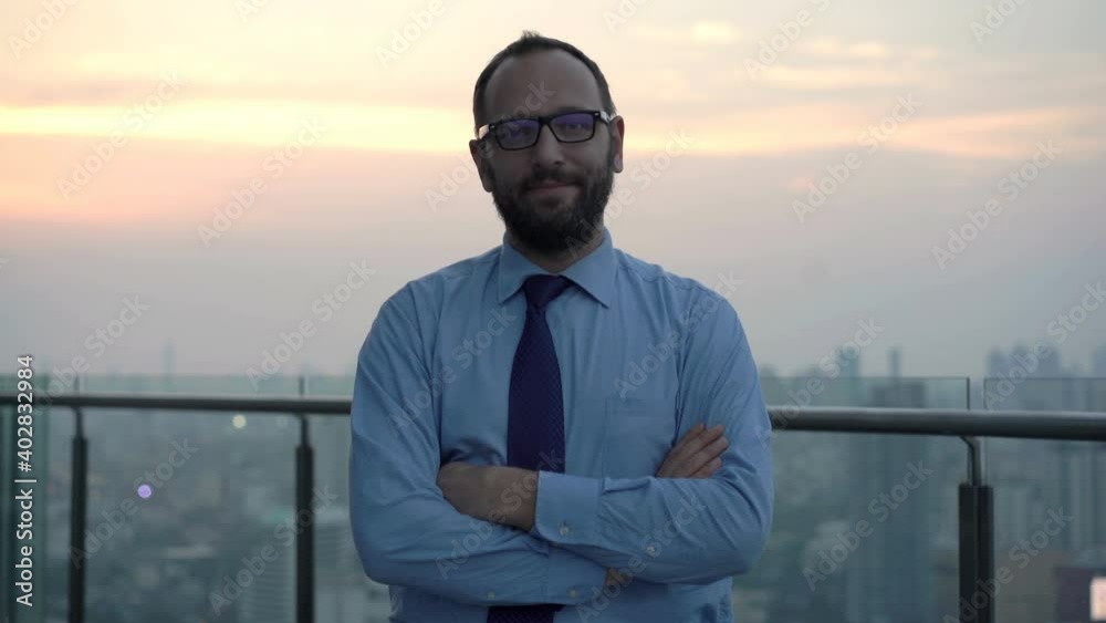 Portrait of young happy successful businessman in the city Portrait of young happy successful businessman in the city