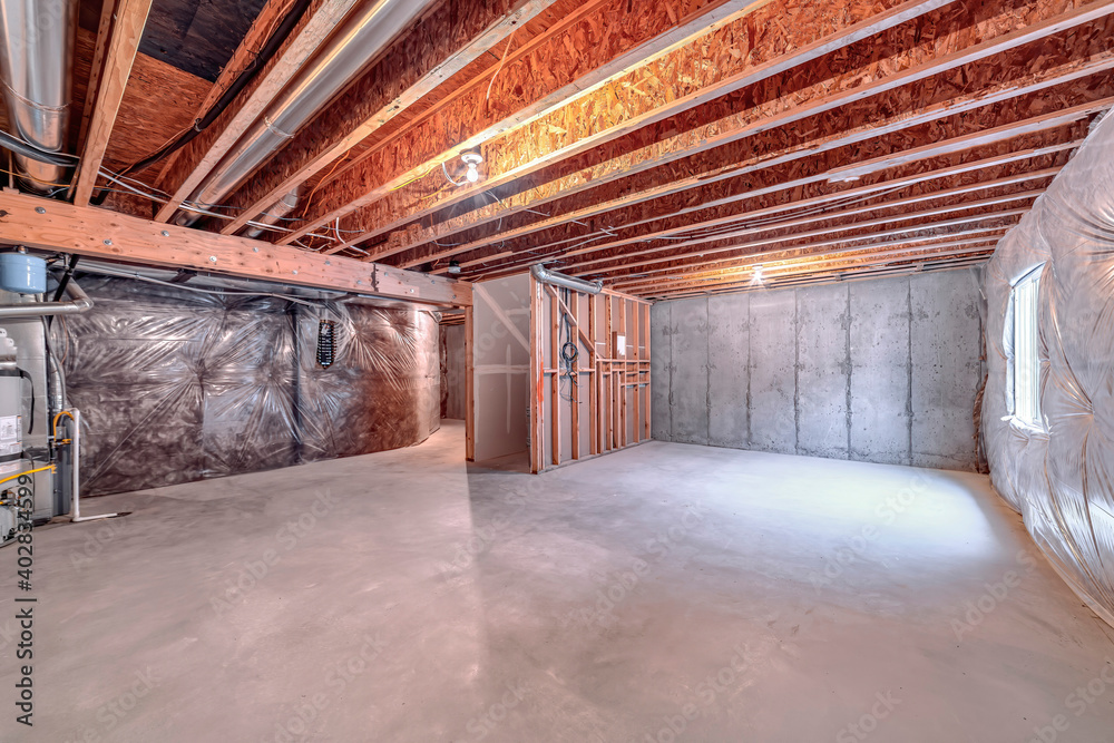 Home interior under construction with wooden framework and air condiioning ducts Home interior under construction with wooden framework and air condiioning ducts