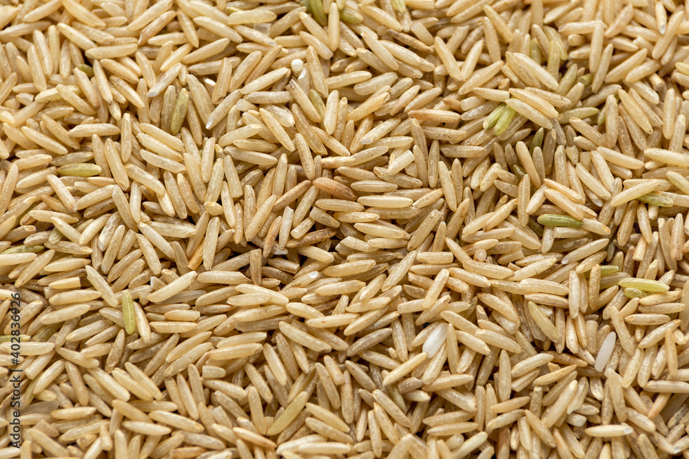 Close up uncooked Brown rice background texture Close up uncooked Brown rice background texture