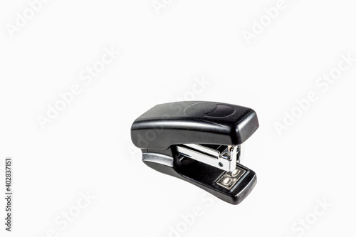 Black stapler. Little. Isolate. Top and side view