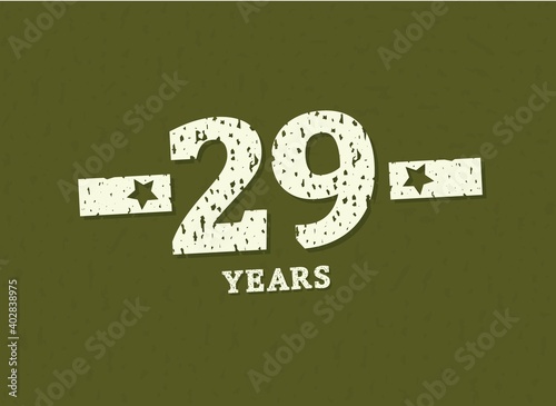 29 years anniversary with badge military, grunge pattern. Army design with star on green camouflage background. Vector perfect for any military labels, posters and armed force etc.