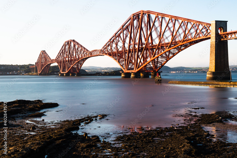 Naklejka premium A nice clear sky view to the beautiful Forth Bridge in scotland wich connects South- and North Queenferry.