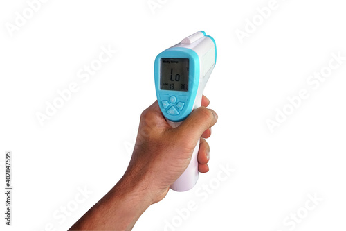 Hand holding a Digital Infrared IR Thermometer for patient screening scan, isolated on white background with clipping path.