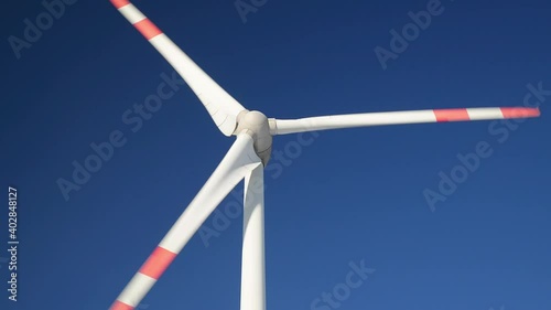 Closeup of a rotating wind turbine. Closeup of a wind turbine nacelle.