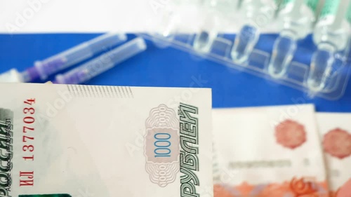 russian flag, vaccine sputnik-V or EpiVacCorona and money, money for purchase and production vaccine concept