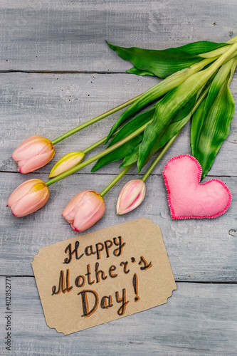 Greetings card for Happy Mothers Day. Gentle pink tulips, handmade felt heart, zero waste packaging gift